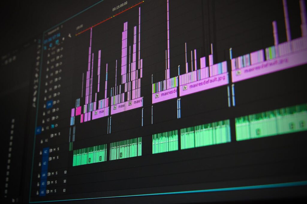pexels-photo-257904 Close-up of a professional audio and video editing software interface with waveform displays.